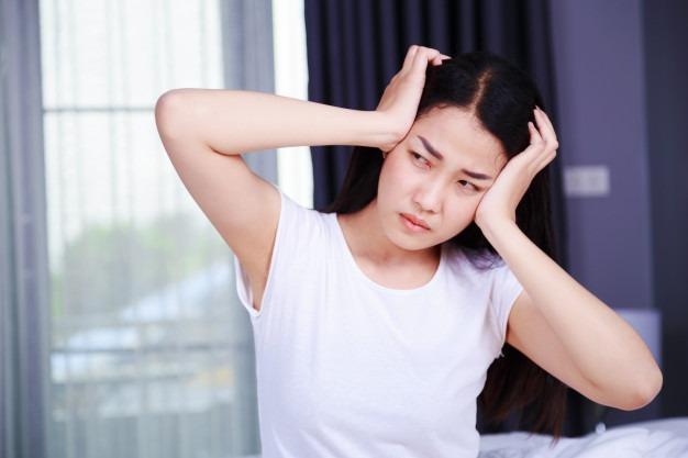 đau đầu do tác dụng phụ của thuốc