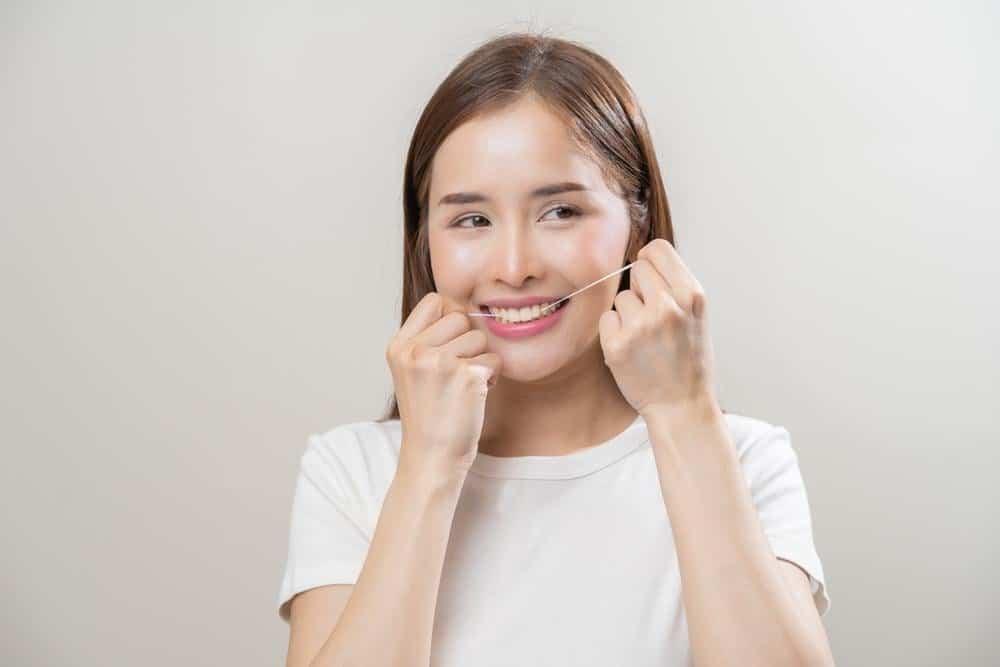 dùng chỉ nha khoa